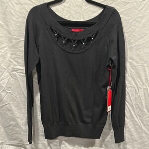 Jennifer Lopez Black Blouse with Cutout Detail